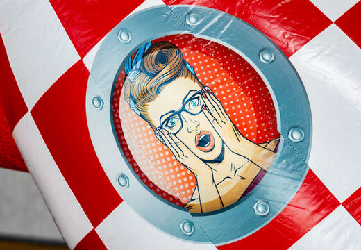 Rocket with startled woman's head on slide combo bouncy castle comic theme
