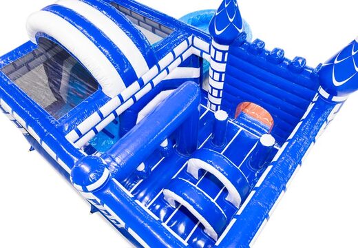 Interior bouncy castle with arches, pillars, and punching bags for sale at JB